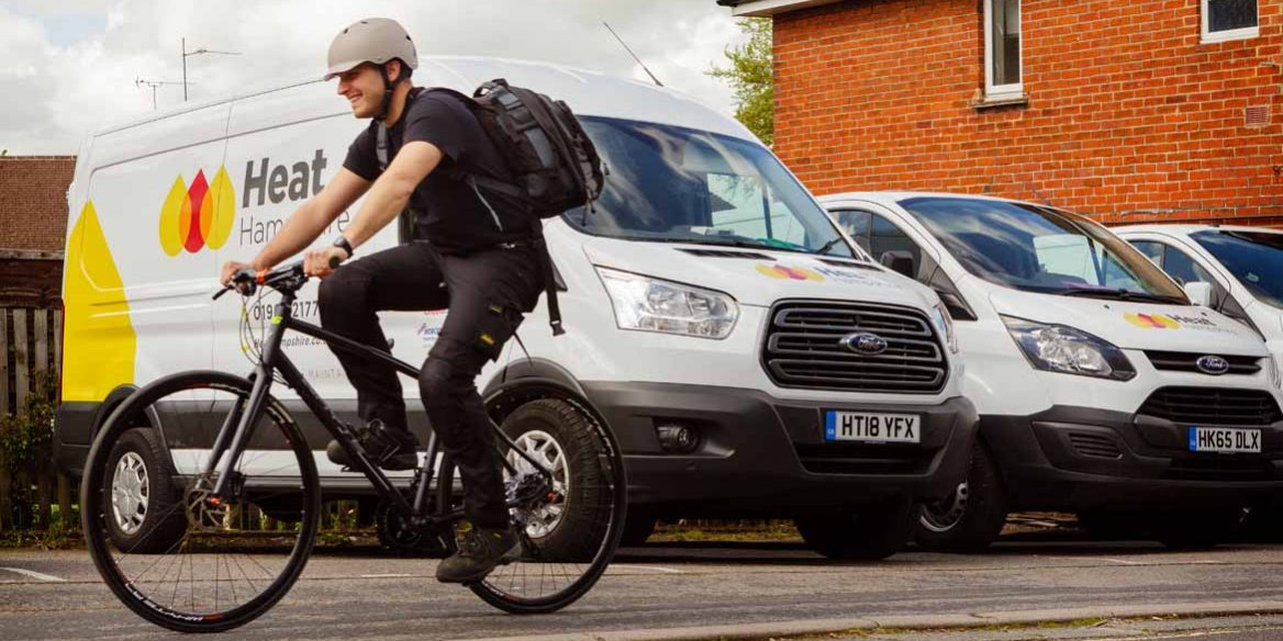 Heat Hampshire engineer riding a bike to a meeting