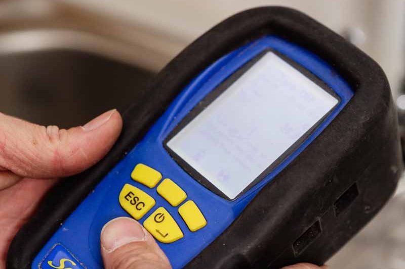 Inspecting and servicing a boiler in Winchester